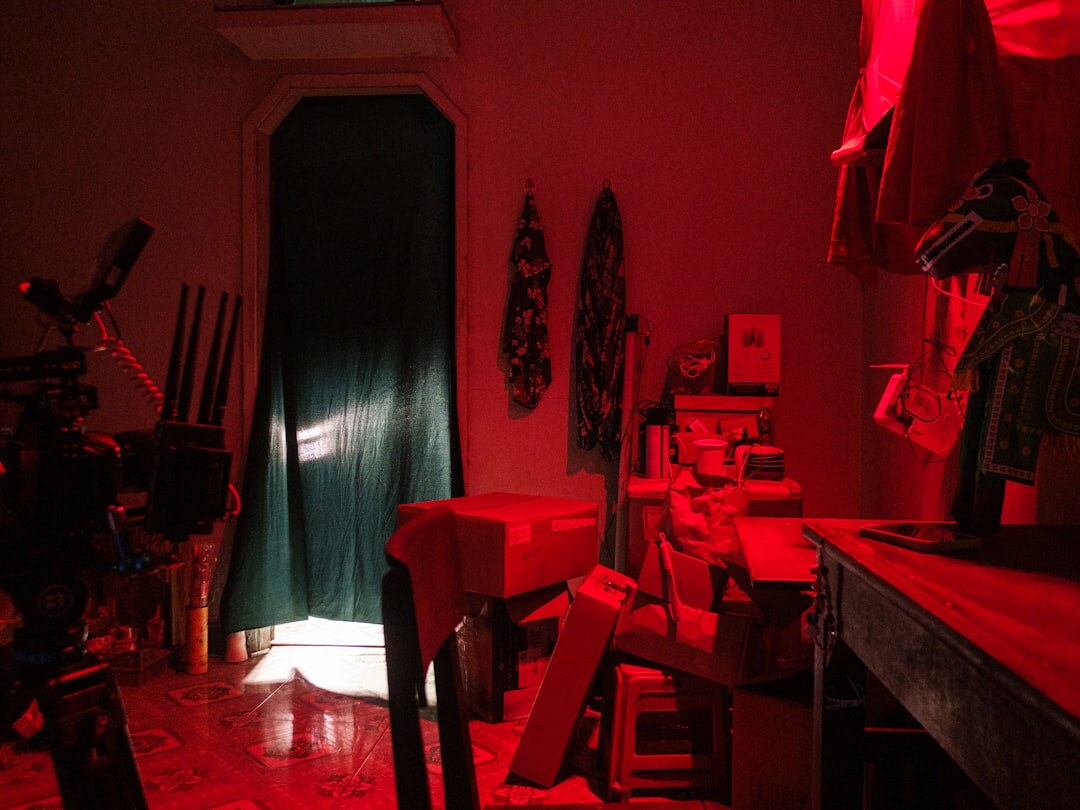 Interior of a film production studio with lighting rigs and camera equipment