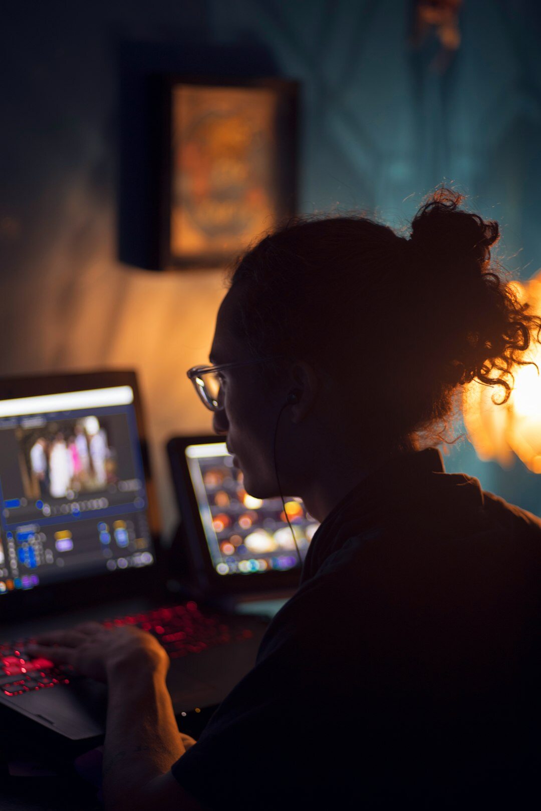 film editor working on computer